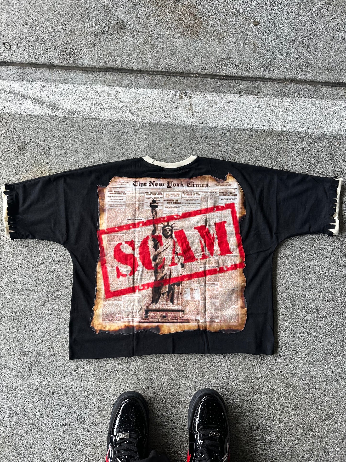 “NA IS A SCAM ” T-Shirt